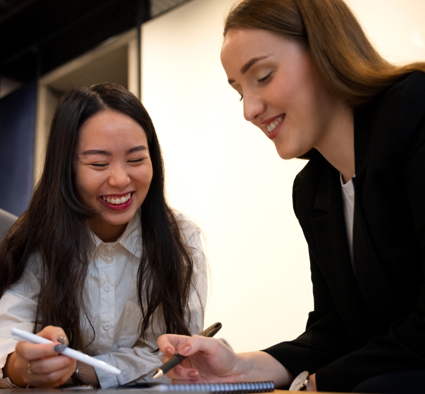 Two students confidently preparing for standardized tests together, representing the mission to empower students and educators with all-in-one test prep solutions.
